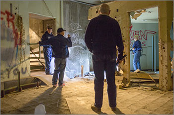 Jim Moore, foreground, and friends tour the silo